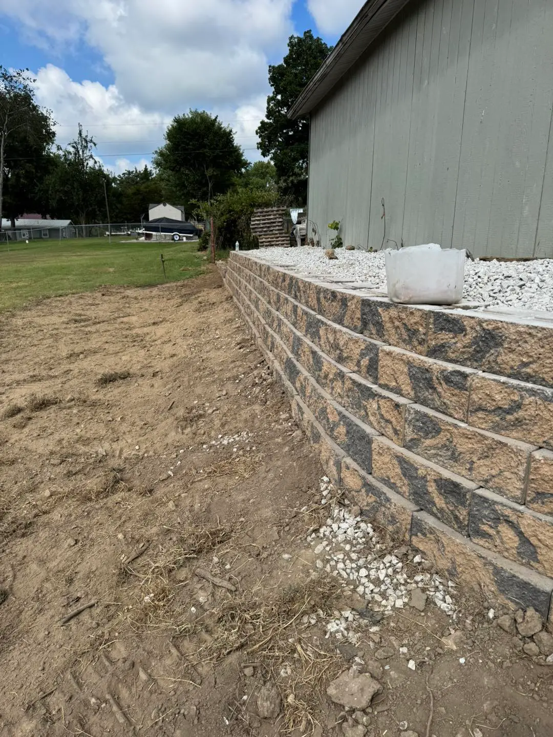 Site grading with retaining work