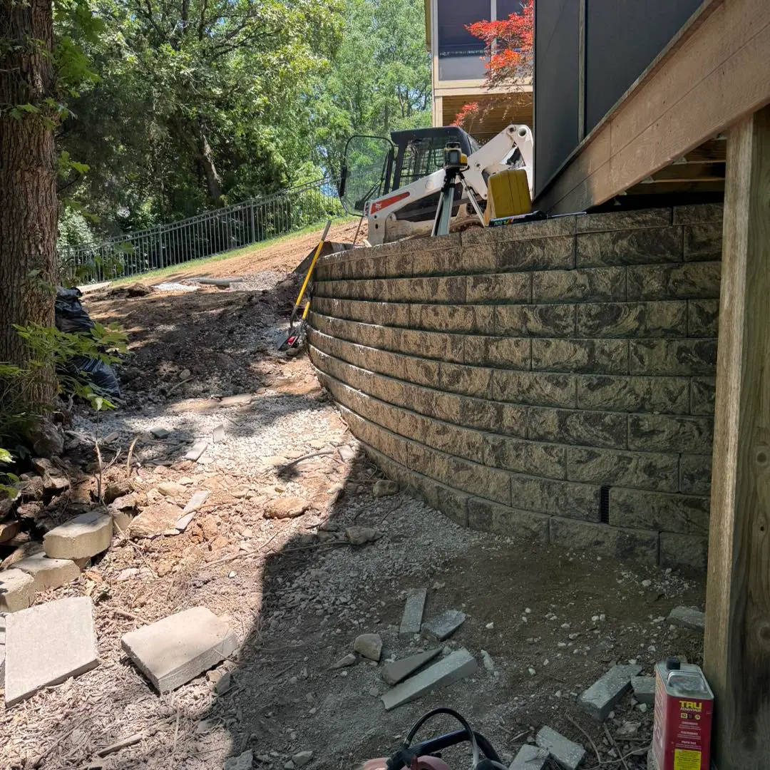 Retaining wall installation and grading by Simpson Excavation LLC